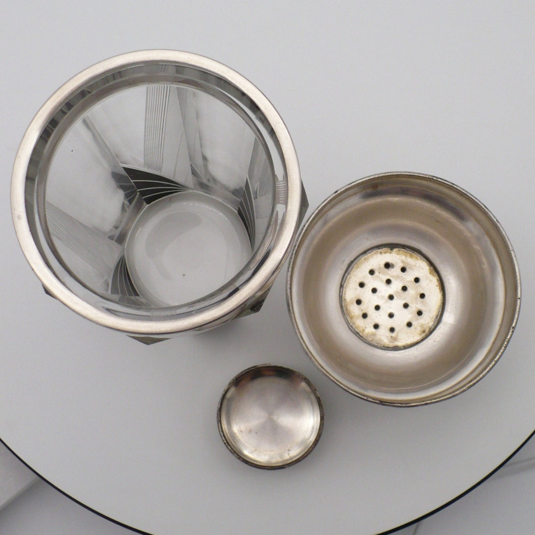 A vintage 1930s Karl Palda Art Deco Crystal Cocktail Shaker built-in strainer lid, and a small cap view 1. Shows container interior.