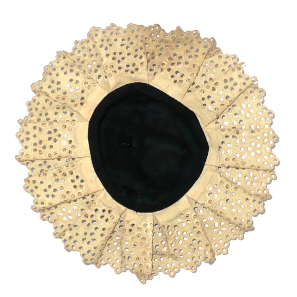 Interior view of antique mobcap hat highlighting the lining and vintage construction details.