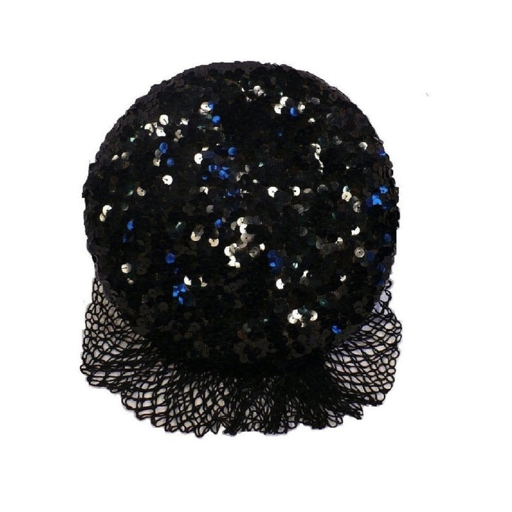Detailed top-down photograph of a 1930s black gelatin sequined cocktail beret hat with a matching mesh veil.
