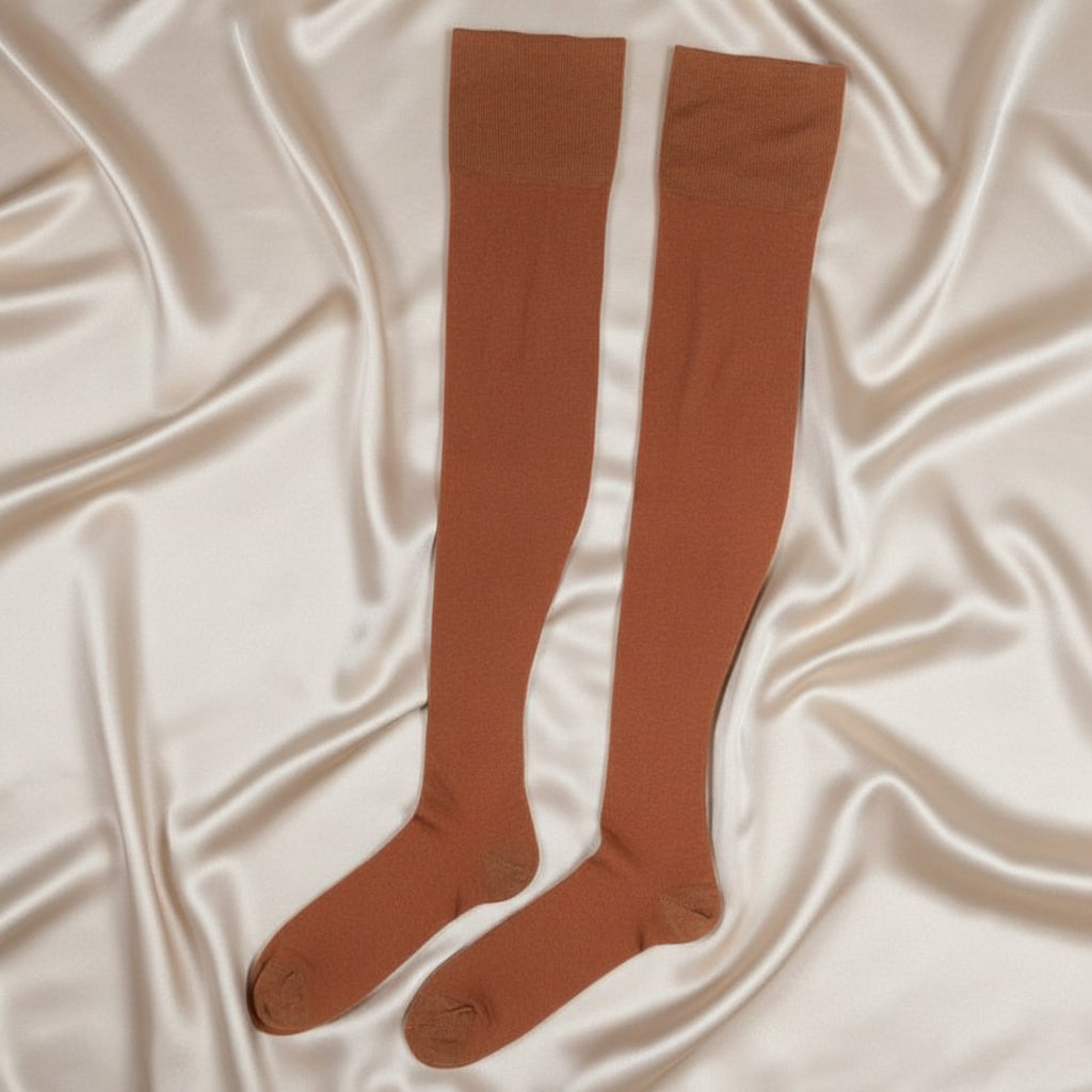 1920 Vintage Rayon Thigh High Garter Stockings Hosiery shown lying flat.