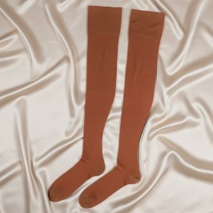 1920 Vintage Rayon Thigh High Garter Stockings Hosiery shown lying flat.