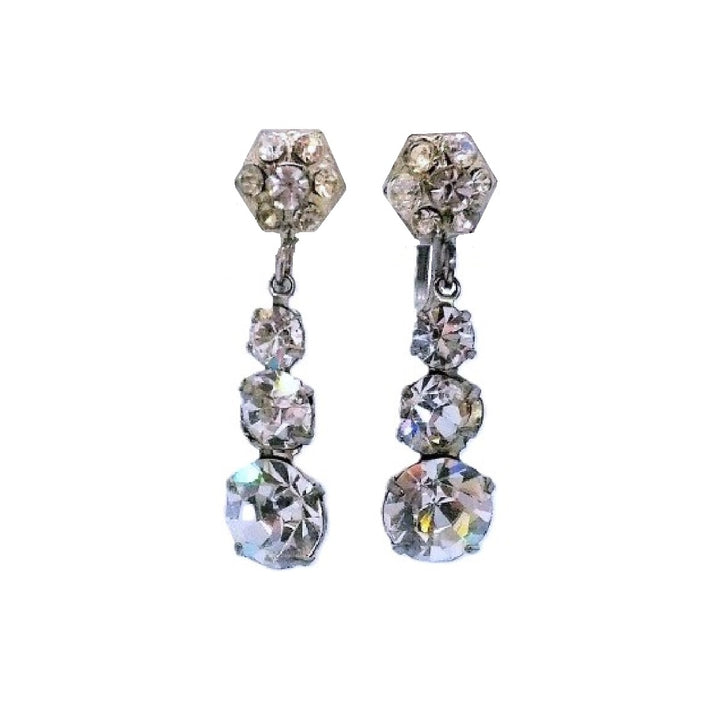 Pair of vintage 1930s Art Deco dangle earrings featuring faceted open-backed rhinestones and screw-back closures.