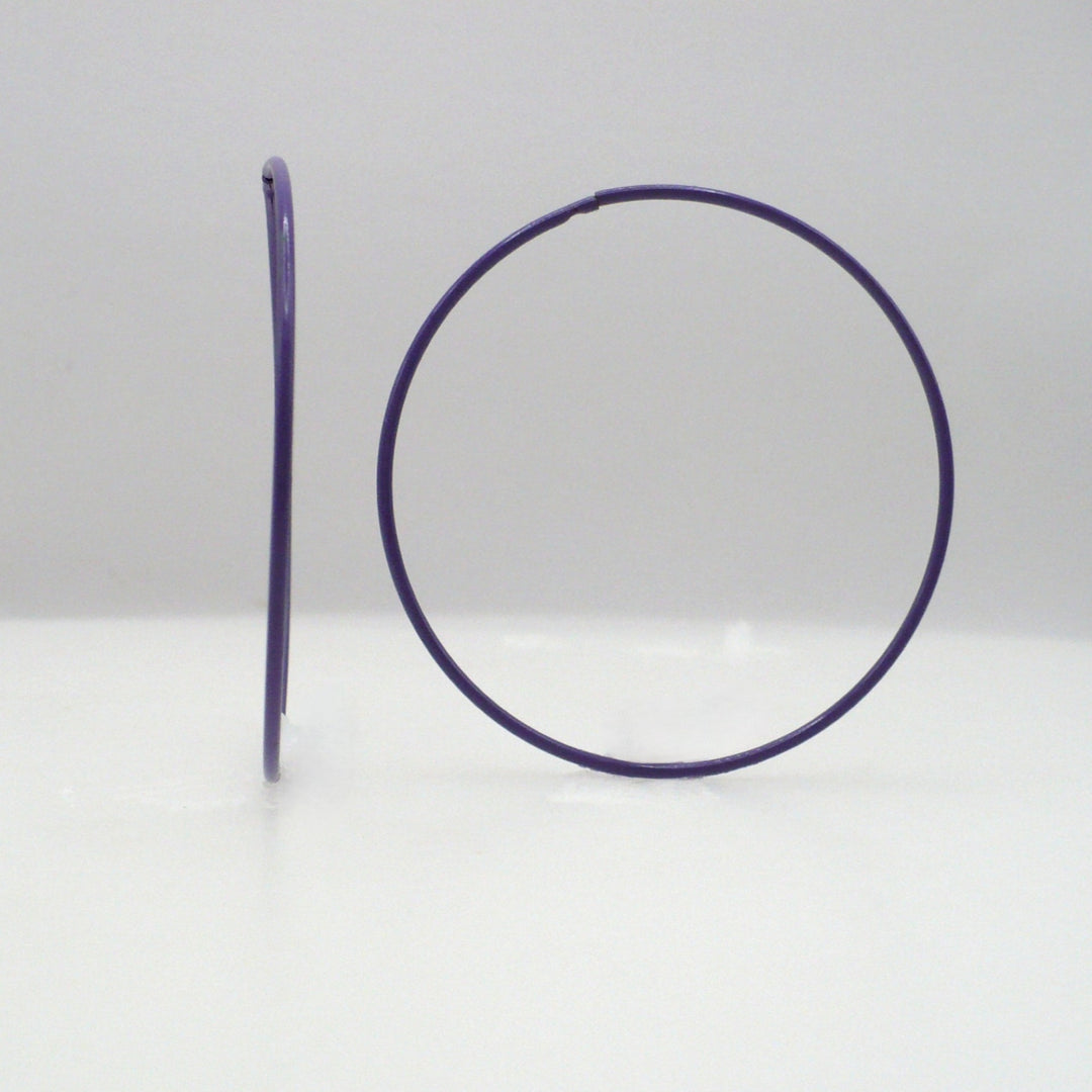 1980s vintage orchid purple pop art Memphis style 2-inch hoop earrings shown side-on and front-facing against a neutral white background.
