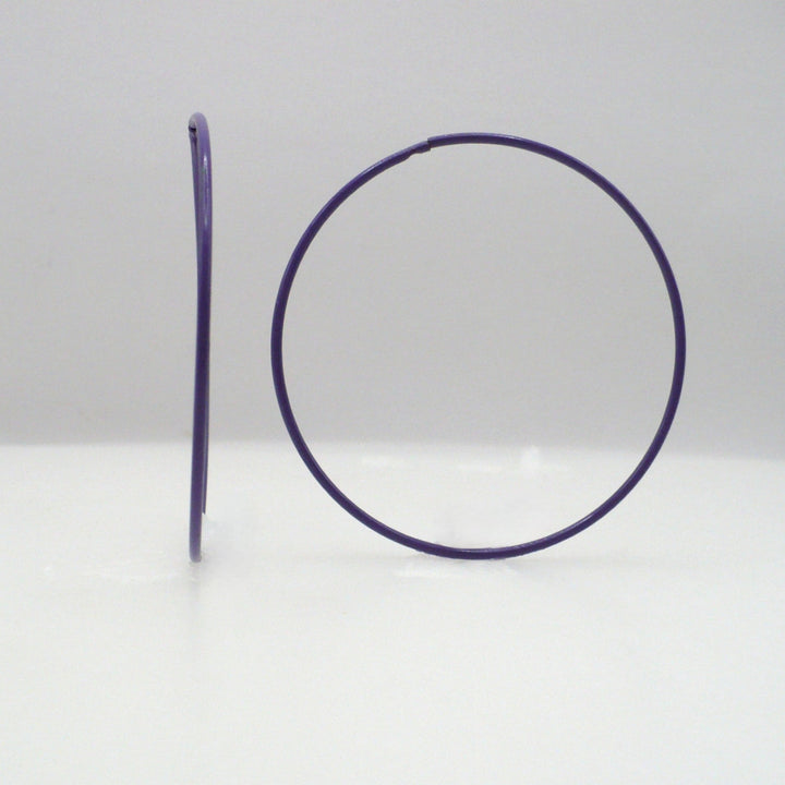 1980s vintage orchid purple pop art Memphis style 2-inch hoop earrings shown side-on and front-facing against a neutral white background.