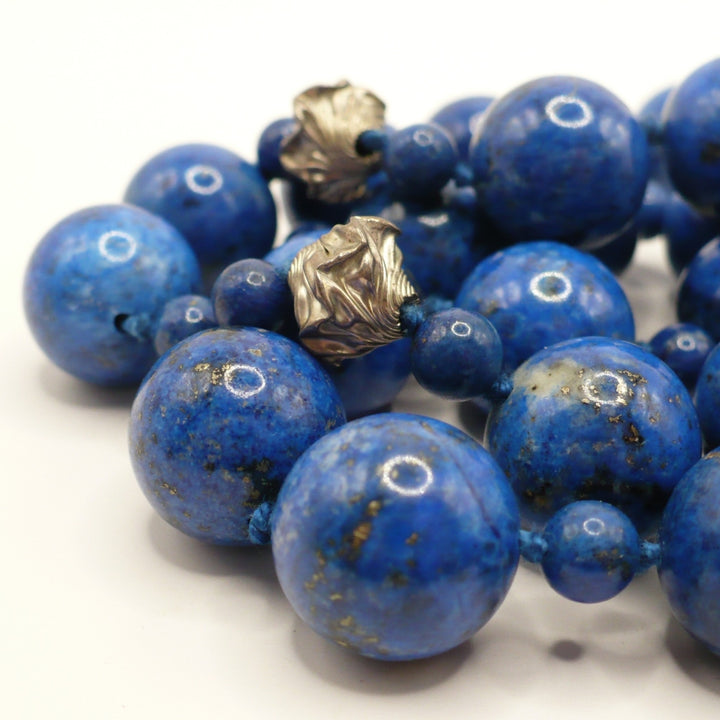 Close-up of the 1970s vintage lapis lazuli beads and ornate silver accent beads.