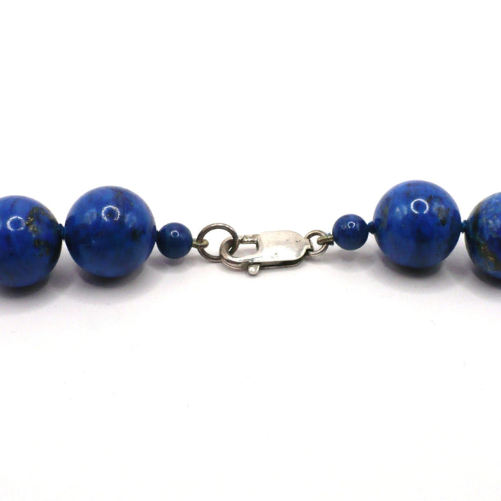 Close-up of the  clasp and blue lapis lazuli beads on the 1970s vintage necklace.