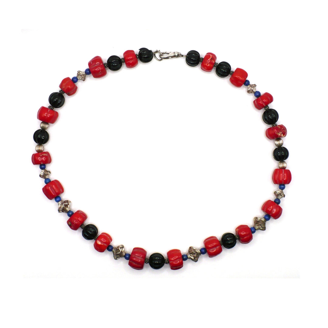 1970s vintage red coral and lapis lazuli statement necklace with sterling silver accents.