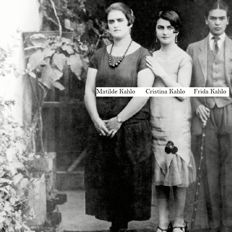 Historical archive photo of Matilde, Cristina, and Frida Kahlo wearing traditional multi-strand and long bead necklace.