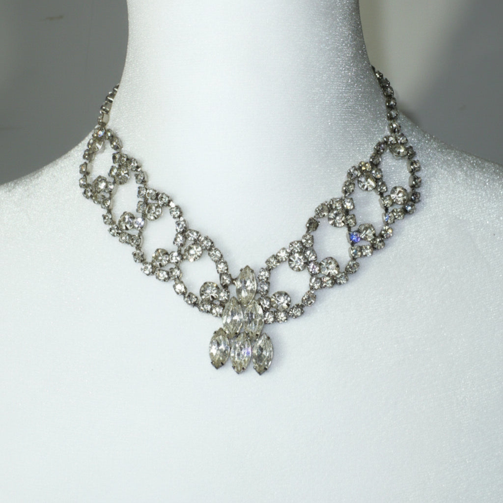 1950s Vintage Rhinestone Burlesque Bib Necklace on dress form.