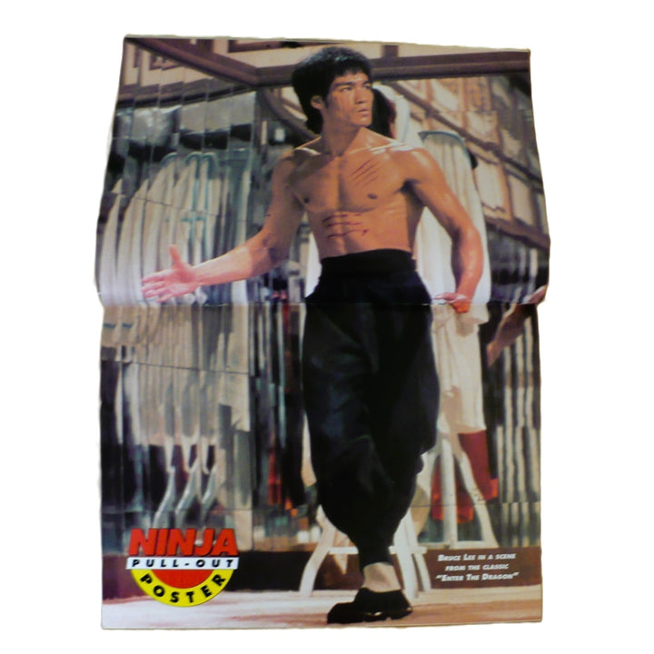 A vintage magazine Ninja Bruce Lee magazine, NINJA Martial Arts magazine, centerfold poster still attached to magazine, shown opened, white background.