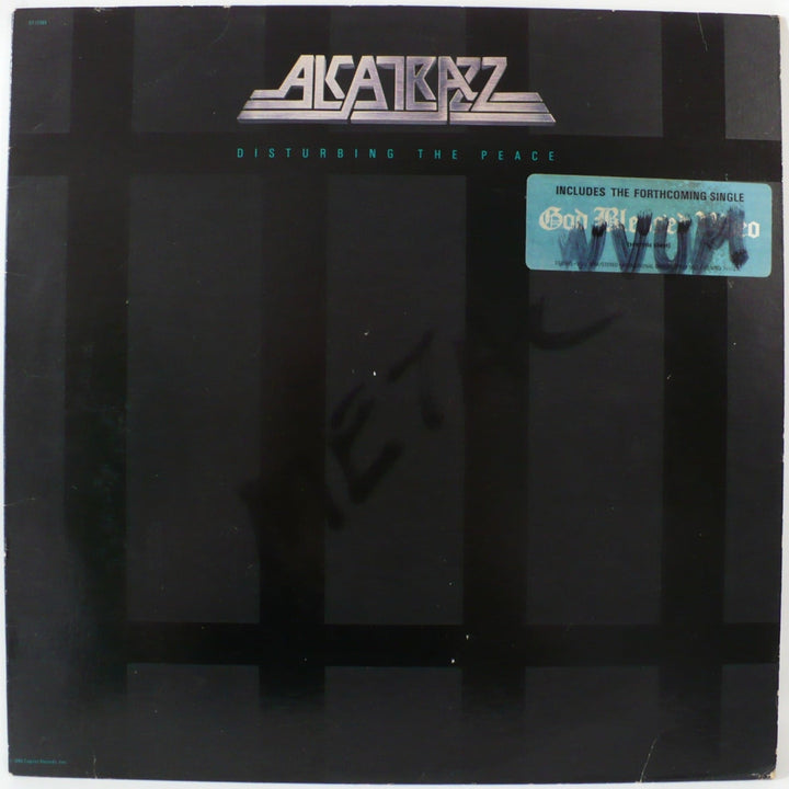 Alcatrazz Disturbing The Peace 1985 Vinyl Promotional Copy First Pressing. front cover.