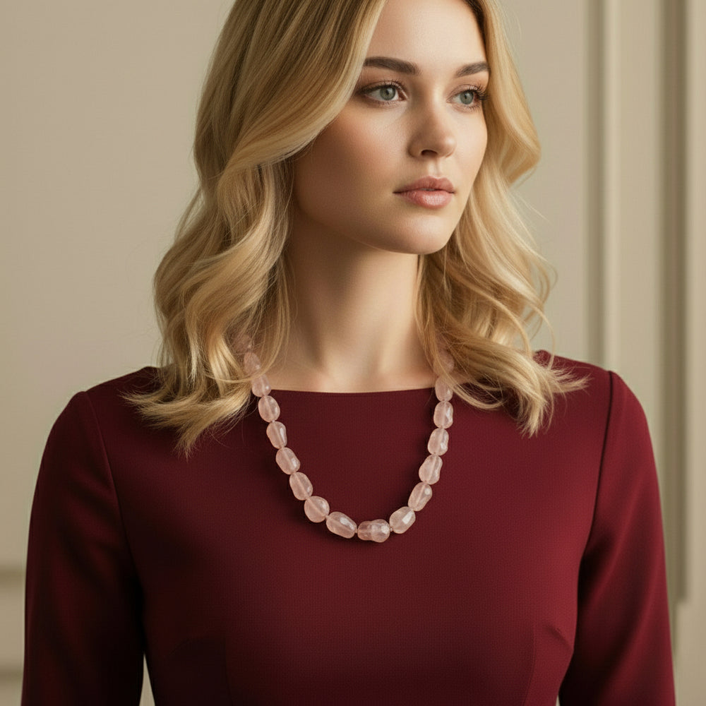 1980s Rose Quartz Nugget Bead Necklace 25", on woman wearing red dress.