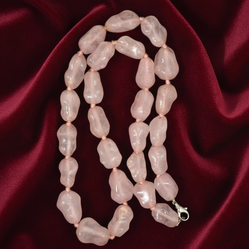1980s Rose Quartz Nugget Bead Necklace 25", on velvet fabric.
