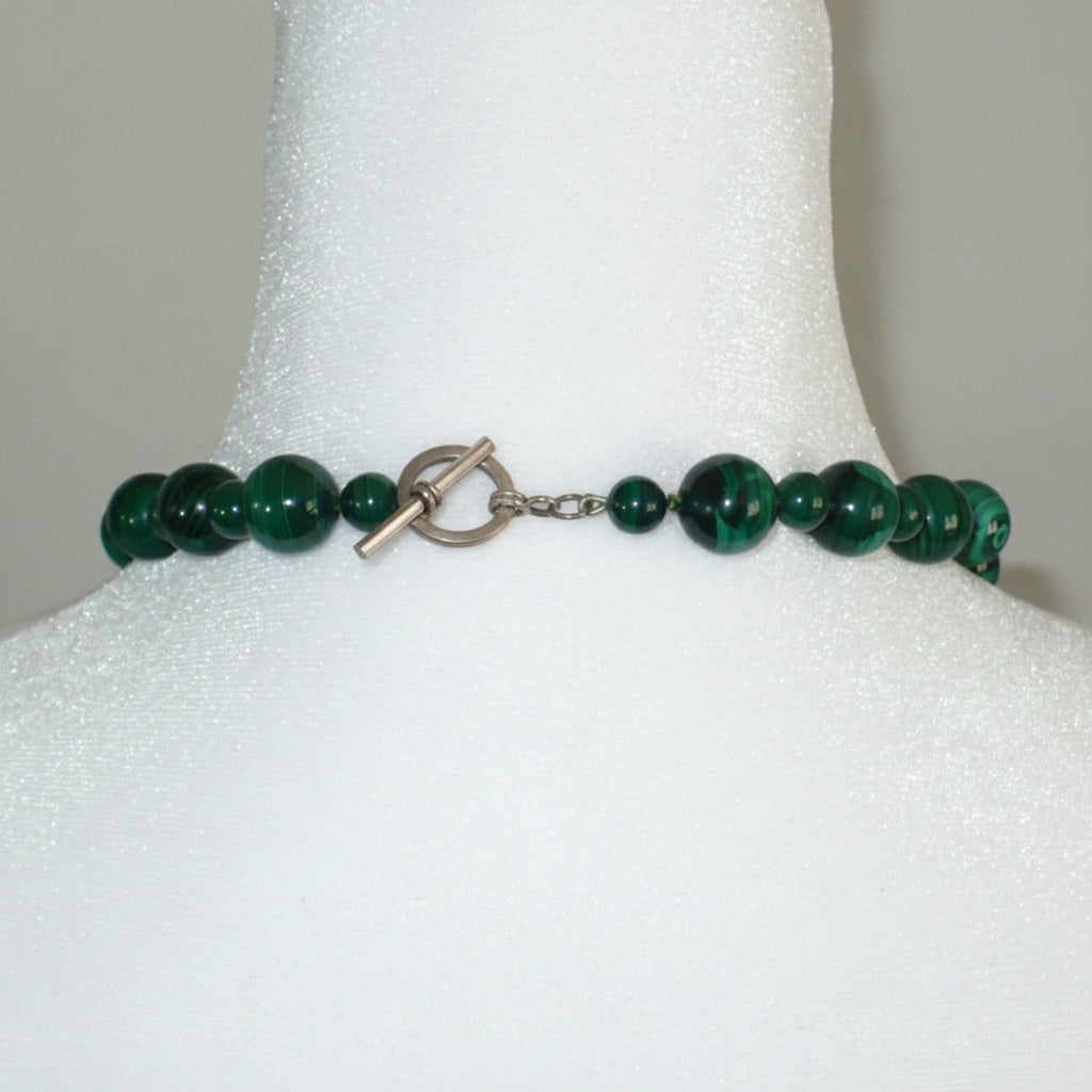 Vintage Green Malachite Beaded Gemstone Necklace with Silver Accents  toggle clasp shown on dress form.