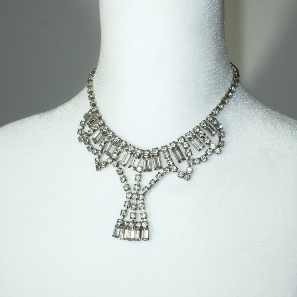 1950s Vintage Art Deco Rhinestone Festoon Necklace on dress form.