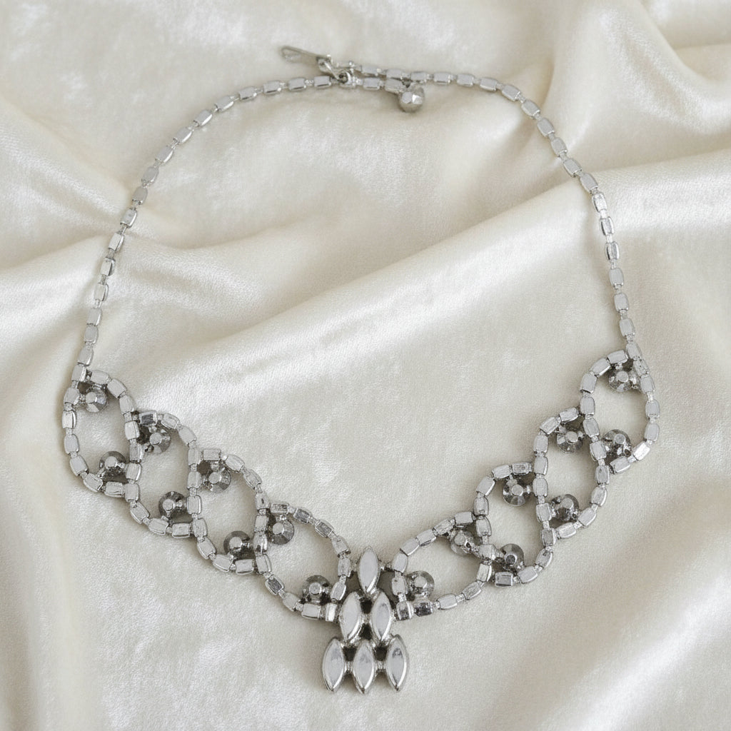 1950s Vintage Rhinestone Burlesque or Prom, stage Bib Necklace, back view on fabric.