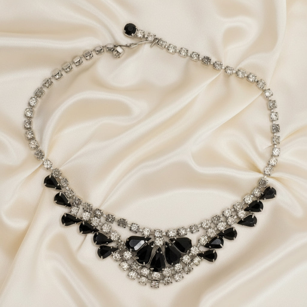 Vintage Black Czech Glass Bib Necklace Adorned with Rhinestones  shown lay– Ideal for Prom or Stage Wear.
