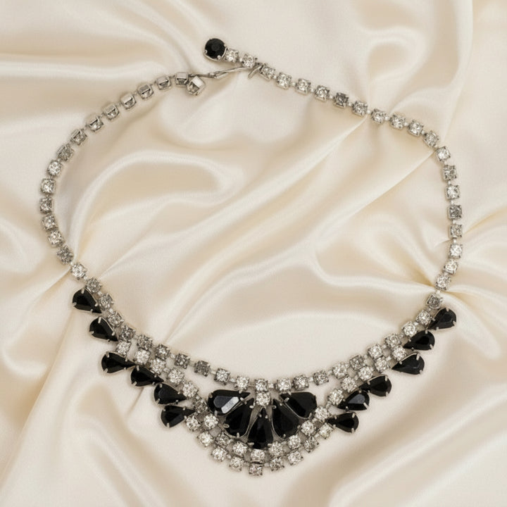 Vintage Black Czech Glass Bib Necklace Adorned with Rhinestones  shown lay– Ideal for Prom or Stage Wear.