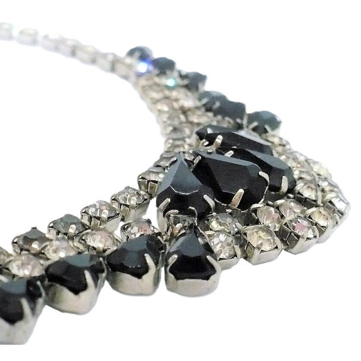 Enlargeed detail shows high quality of stones and pring settings on Vintage Black Czech Glass Bib Necklace Adorned with Rhinestones – Ideal for Prom or Stage Wear