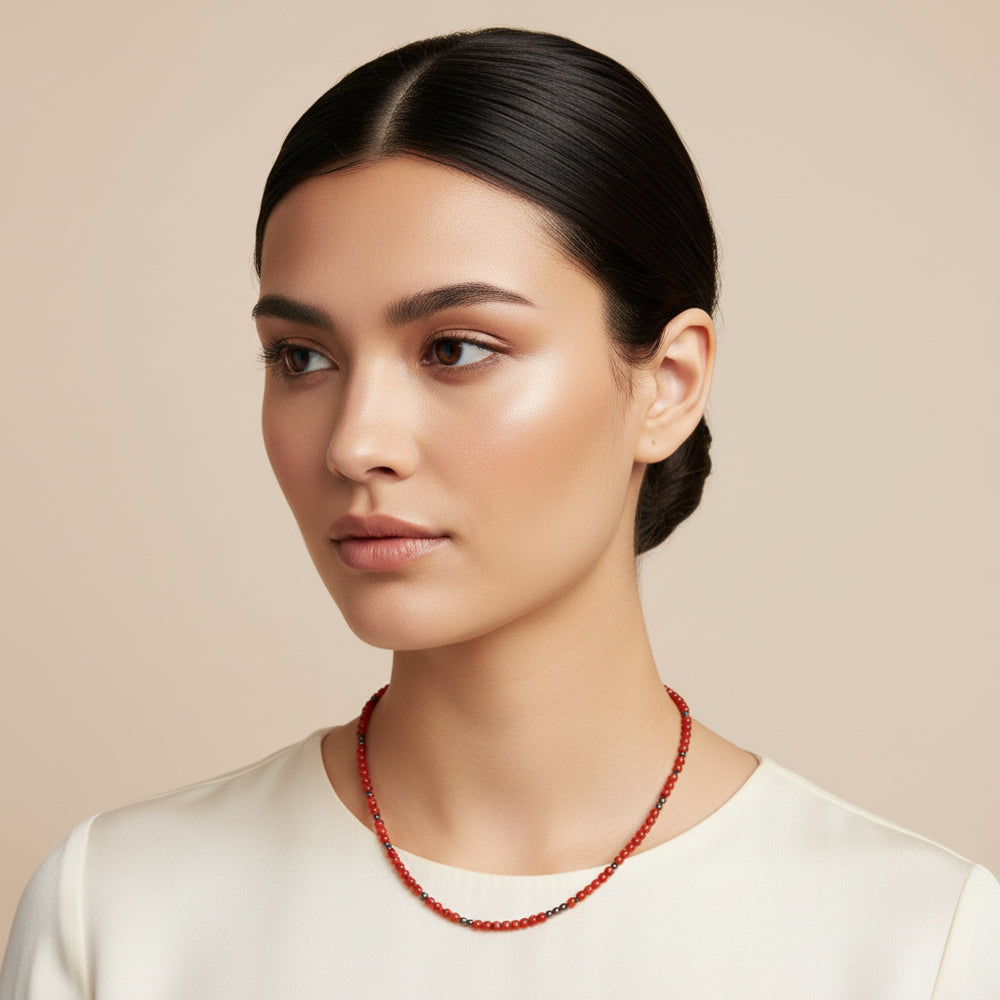 1970s Vintage Coral & Hematite beaded  Necklace on woman model.