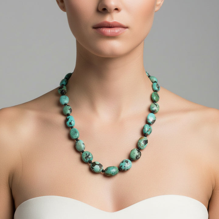 1970s Vintage Hubei Turquoise Beaded Necklace on woman.