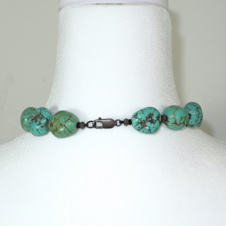 1970s Vintage Chunky Hubei Turquoise Beaded Statement Necklace show sterling silver lobster claw clasp.