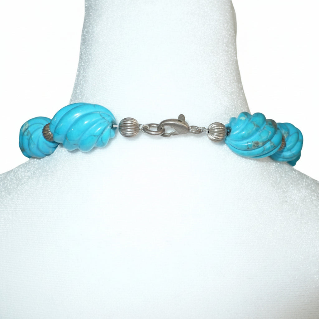 1970s Vintage Blue Howlite and silver beaded Necklace on dress form chows silver lobster clasp.