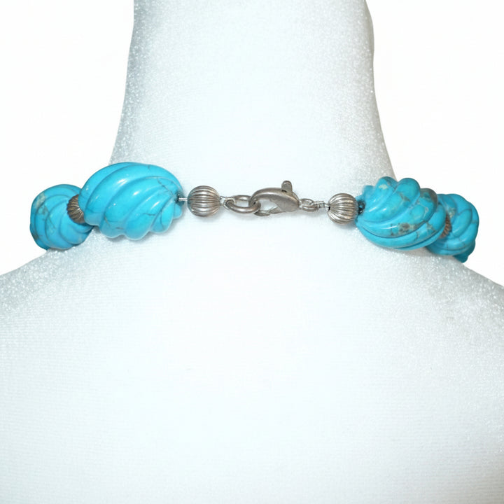 1970s Vintage Blue Howlite and silver beaded Necklace on dress form chows silver lobster clasp.