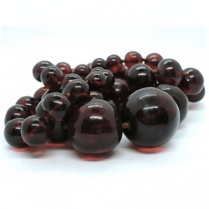 Edwardian to 1920s Vintage Cherry Amber Beaded Necklace shows high quality beads.