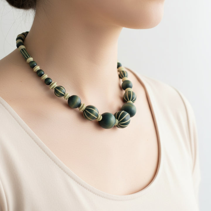 Vintage 1920s Pumtek Beaded Necklace Fossilized Opalized Wood on model.