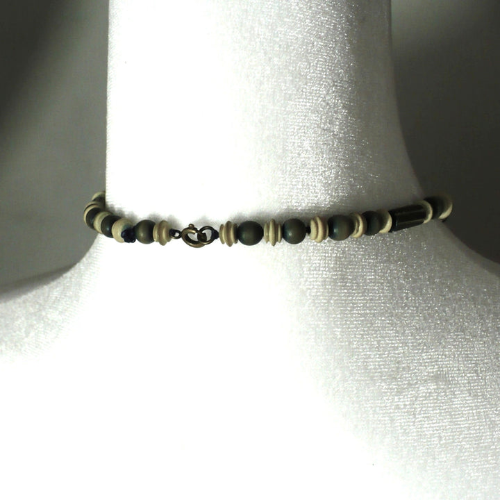 Vintage 1920s Pumtek Beaded Necklace Fossilized Opalized Wood, shows working spring ring clasp.