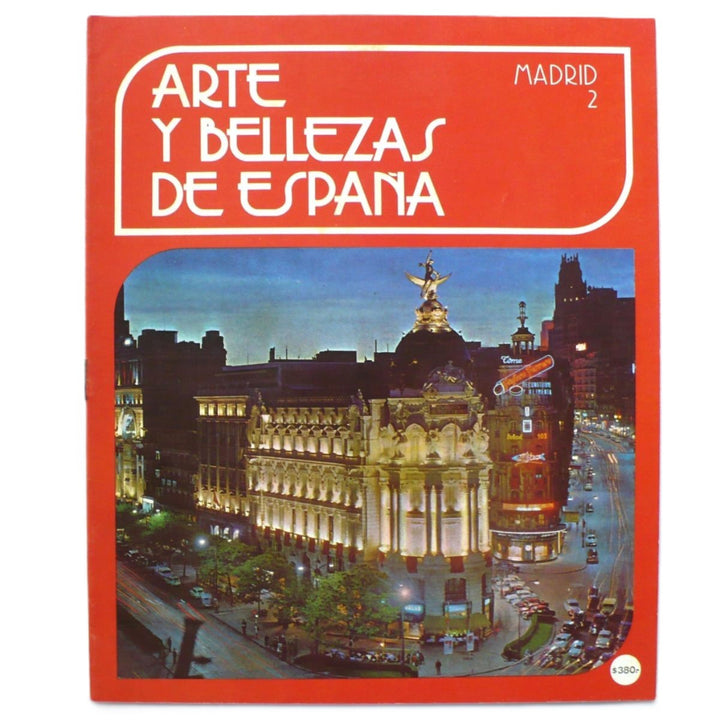 Cover of 'Arte Y Bellezas De España Volumen 2 Madrid', featuring a photograph of a street in Madrid with the Royal Palace in the background, and the title text along with the brand 'Viscontea Argentina'.