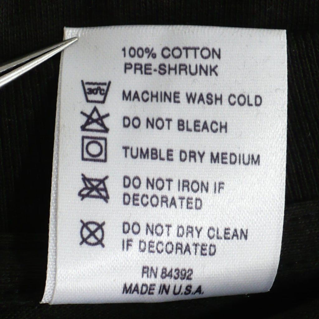 Vintage 1994 "The Crow" T-Shirt – Eric Draven, Brandon Lee, GEM Entertainment  t-shirt tag care instructions.