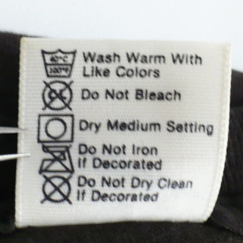 Back of label tag shows care instructions on  1985 Deep Purple Perfect Strangers Tour of T-Shirt.