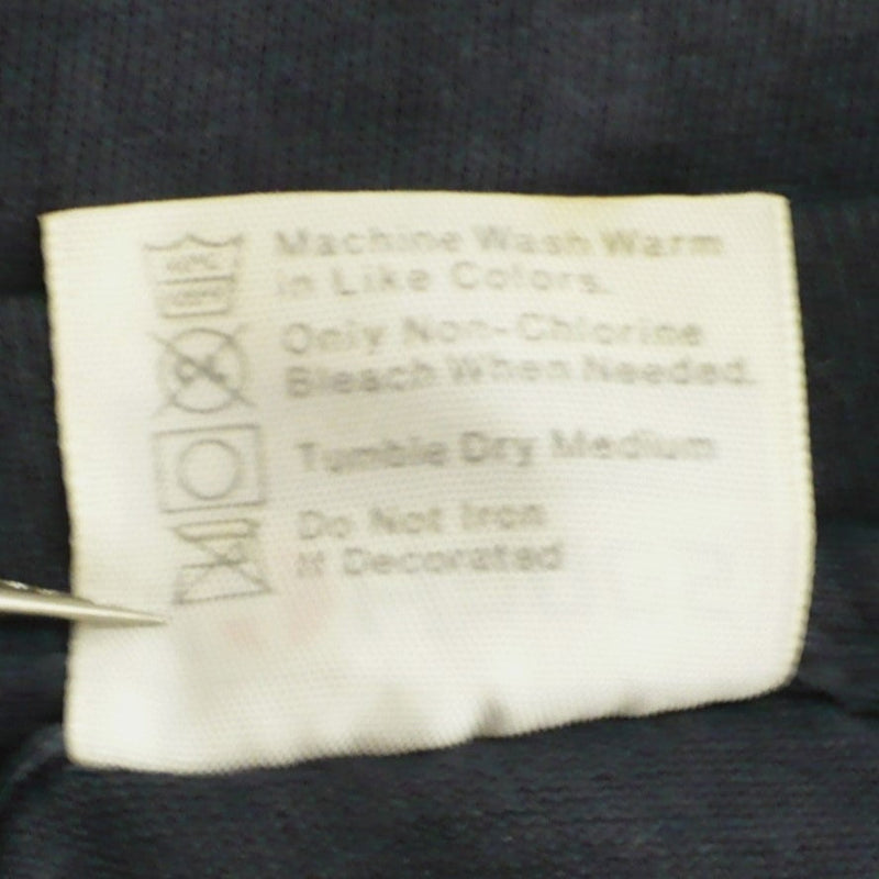 Vintage Dokken Under Lock and Key Tour T-Shirt 1985/1986 back of tag shows care instructions.