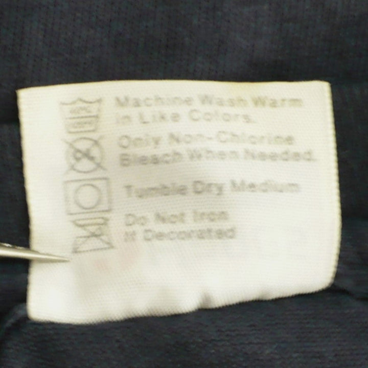 Vintage Dokken Under Lock and Key Tour T-Shirt 1985/1986 back of tag shows care instructions.