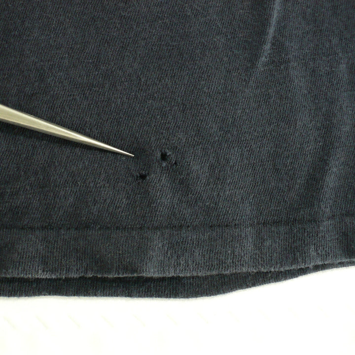 Iron Maiden World Piece Tour Shirt flaw noted in description.