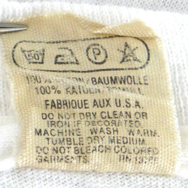 Jake E. Lee Shirt & Fine Pink Mist Tour 1994 care instructions on tag.