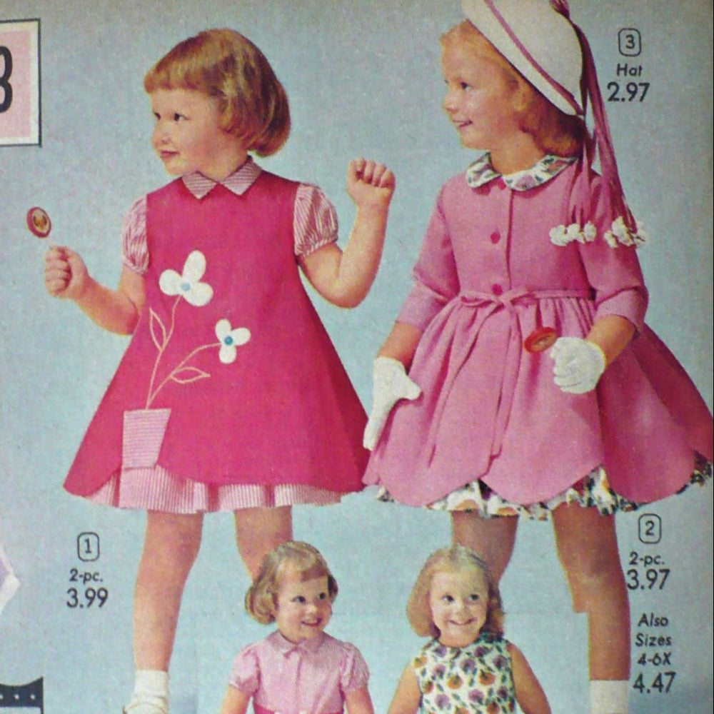 Vintage advertisement for children's dresses with model wearing white gloves.