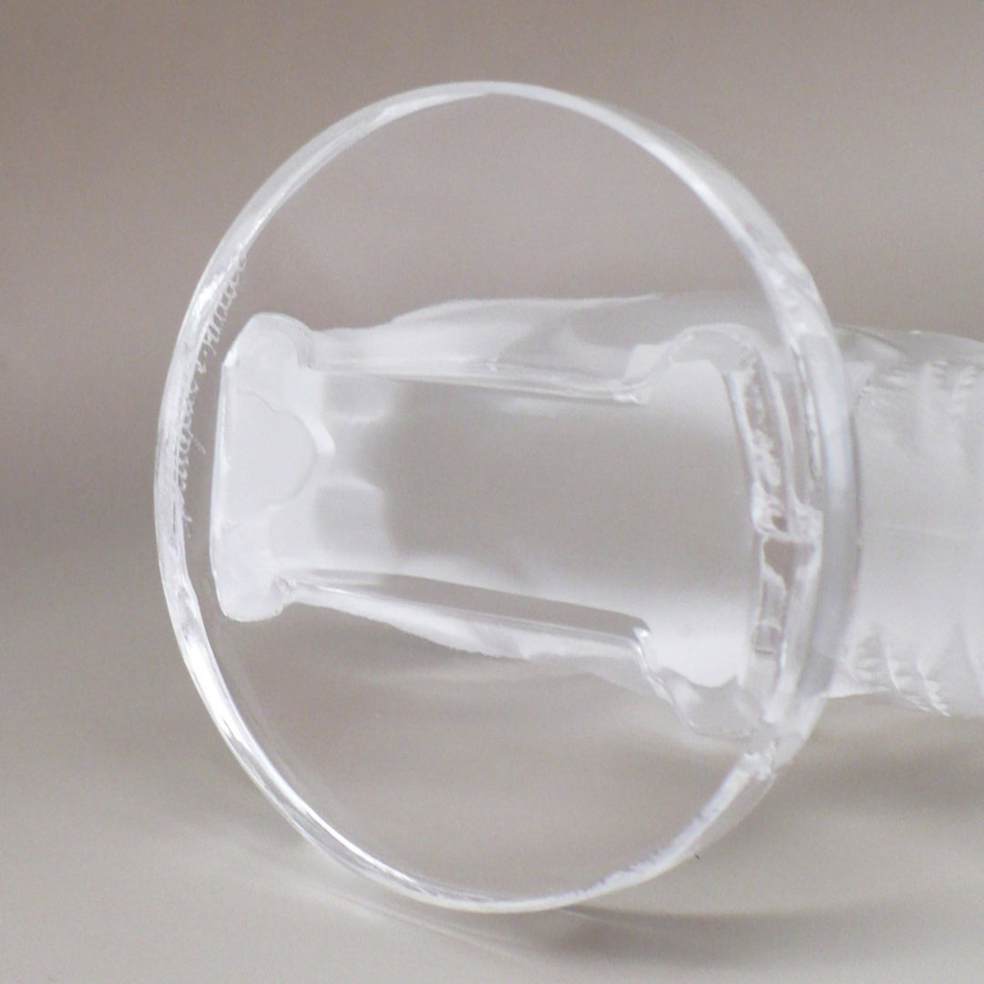 A frosted glass sculpture of Lalique Sanglier Bouchon de Radiateur: Wild Boar Car Mascot, close-up of base.