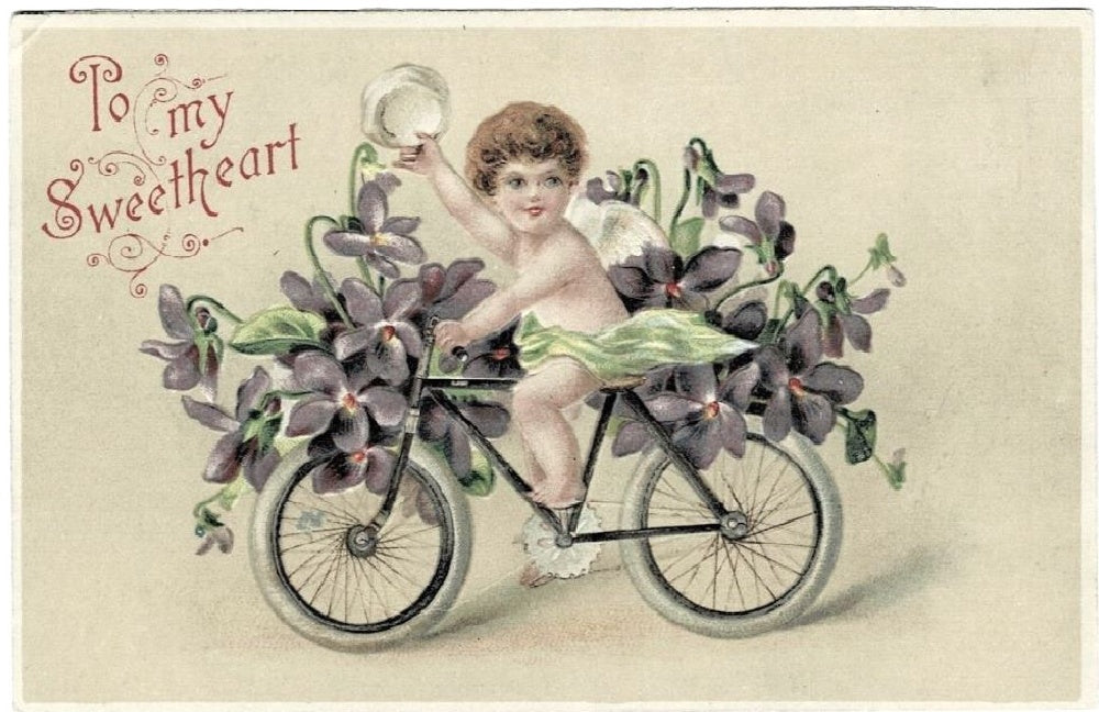 1908 Cupid Delivers Flowers Bicycle Antique Vintage Valentine Postcard.