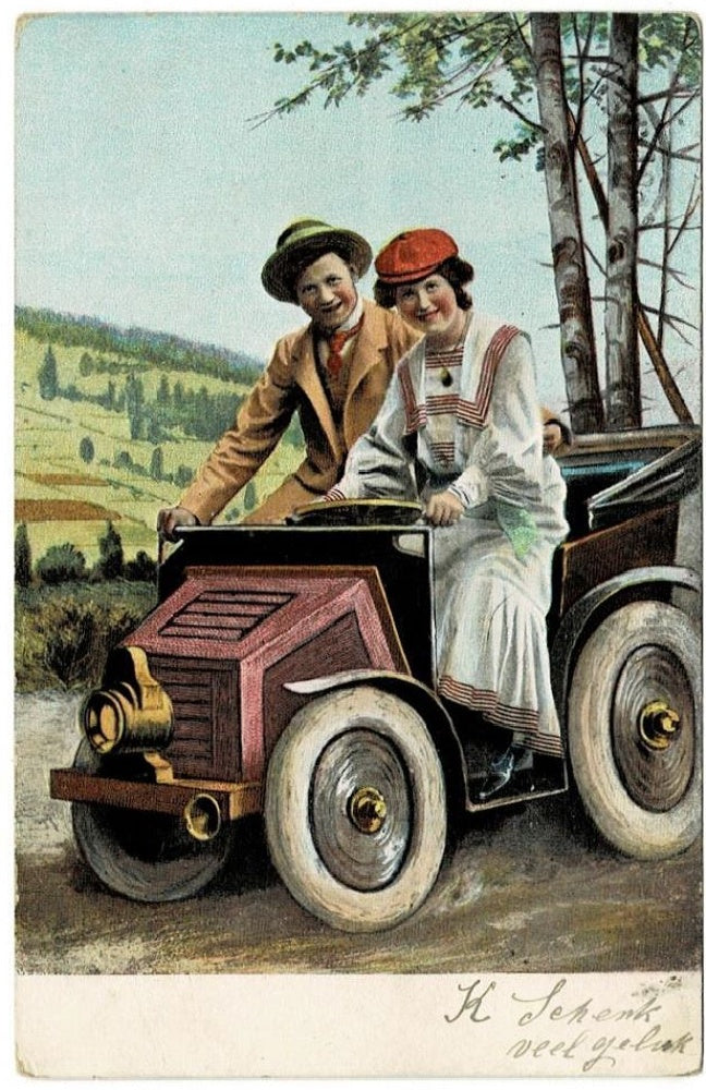 Antique, vintage Valentine, romance, or courtship postcard of couple in jalopy roadster.
