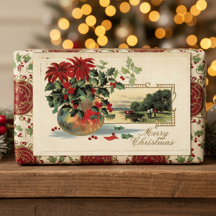 Decorative Christmas box with f1912 Horse Drawn Barge in Canal Vintage Christmas Postcard, blurred lights in the background.