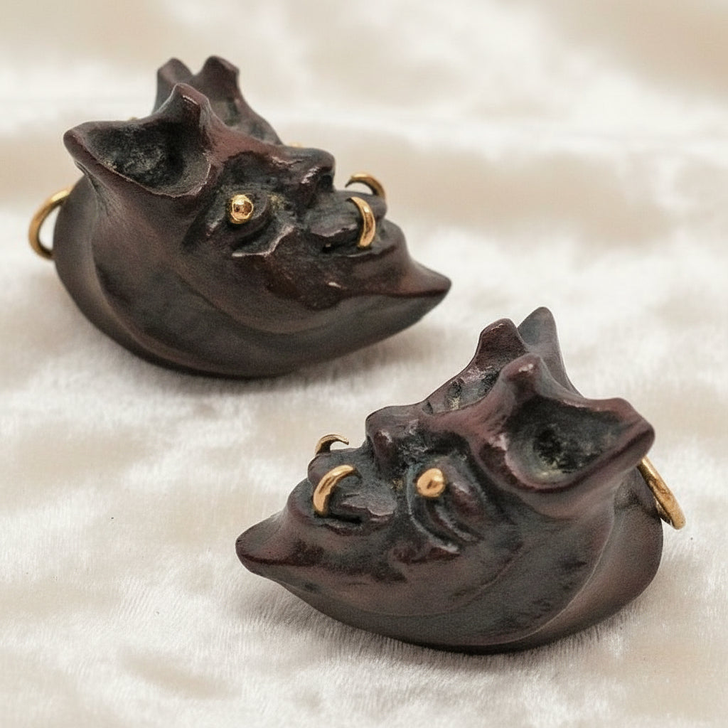 1960 Vintage Samurai Oni Hannya Mask Warthog Pendant with velvet background.