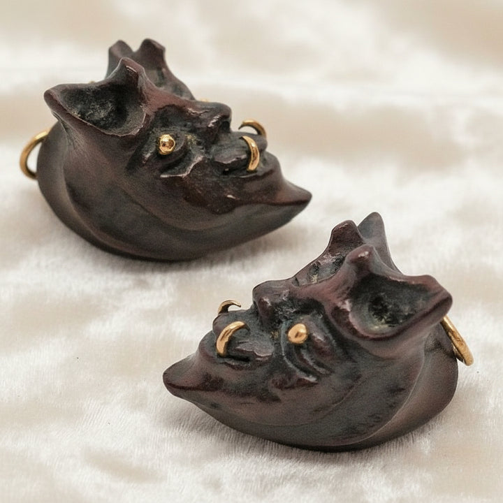 1960 Vintage Samurai Oni Hannya Mask Warthog Pendant with velvet background.