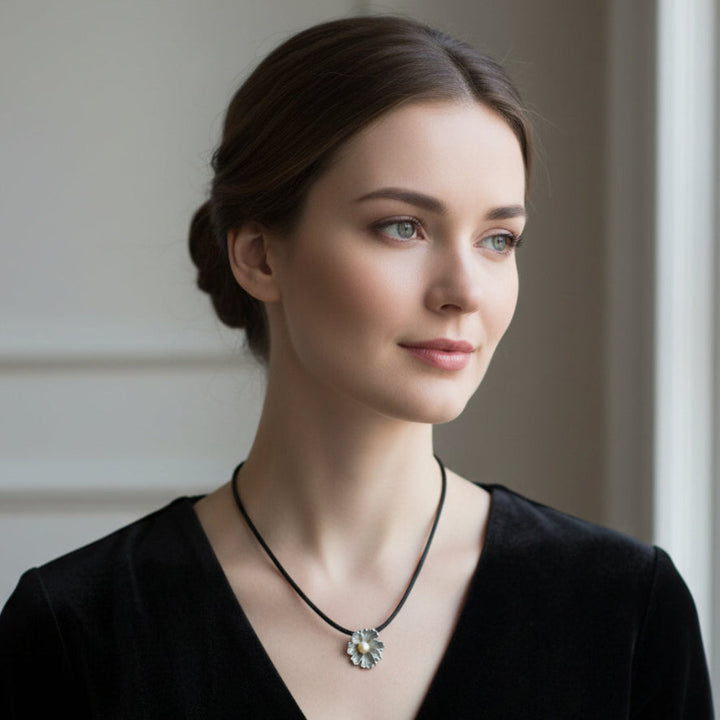 Woman wearing Silver Flower and Pearl Pendant.