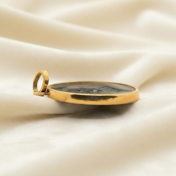 Necklace with a 1980s Vintage 24k Gold and Bronze Perseus Medallion Pendant  side view.