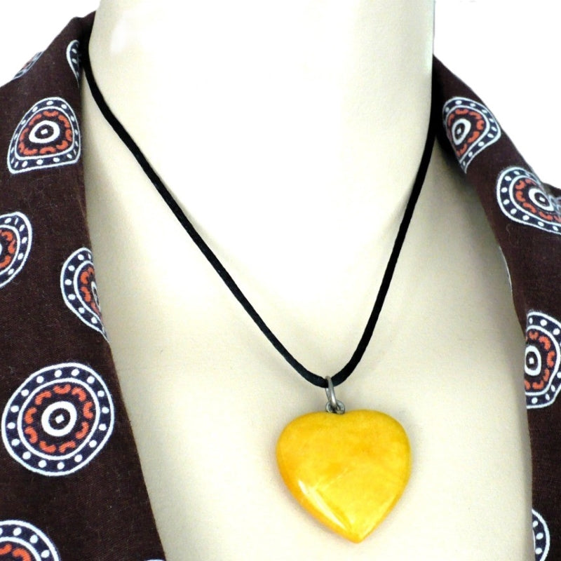 Carved Yellow Calcite Heart Pendant.