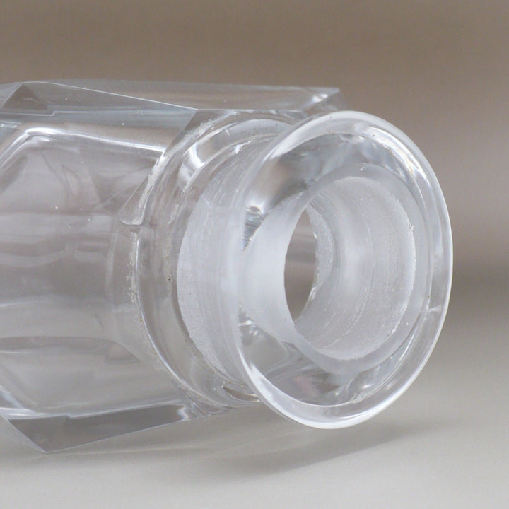 A close-up of Cristalleries de Nancy Art Deco Crystal Perfume Bottle mouth opening.