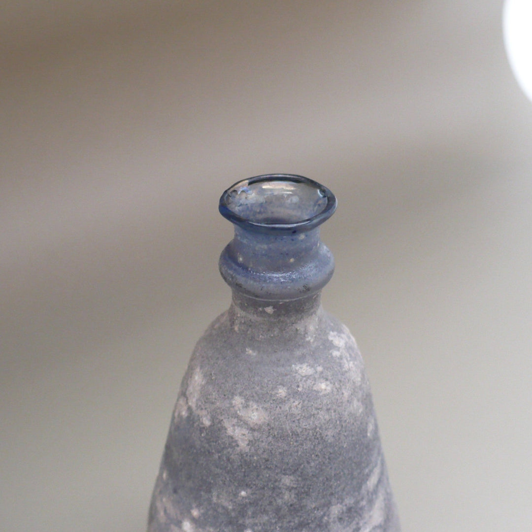 A close-up of the mouth and neck of 1960s Blue Miniature Amphora by Mingus Glass, Argentina.